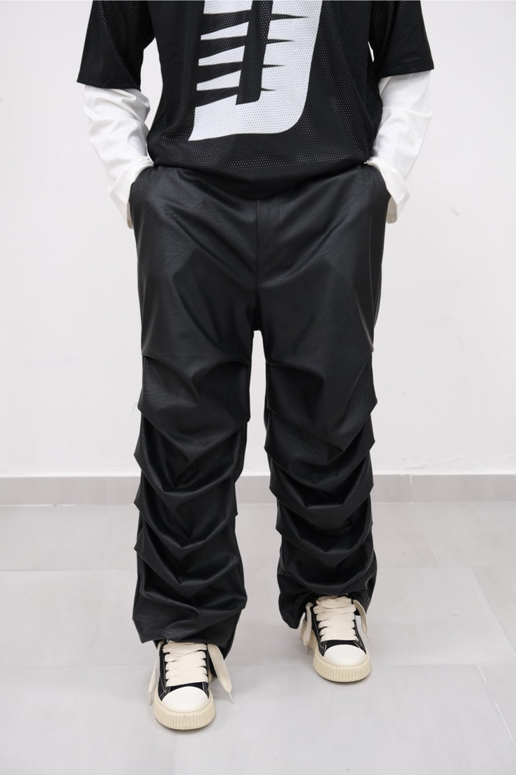 Pantalone ecopelle drappeggiato