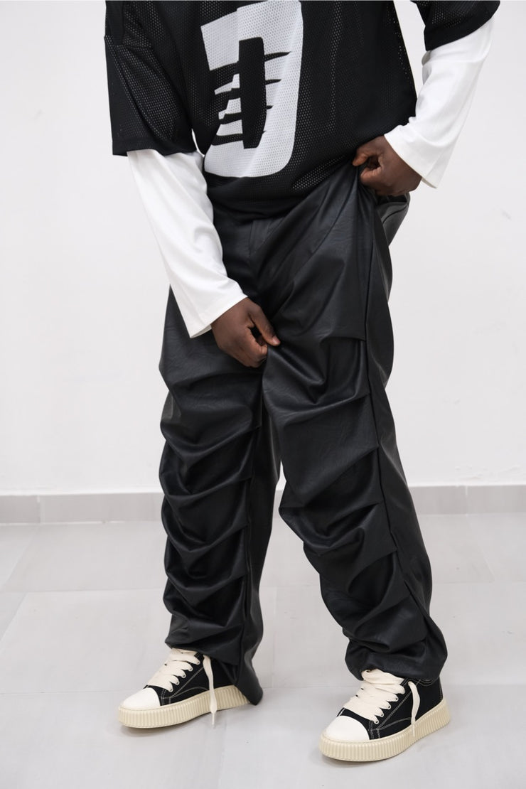 Pantalone ecopelle drappeggiato